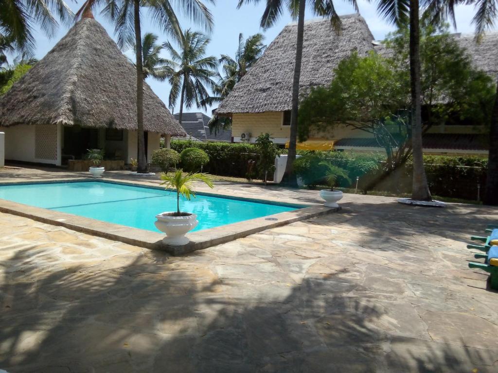 Bazén v ubytování Glory Ocean Villas - Diani nebo v jeho okolí