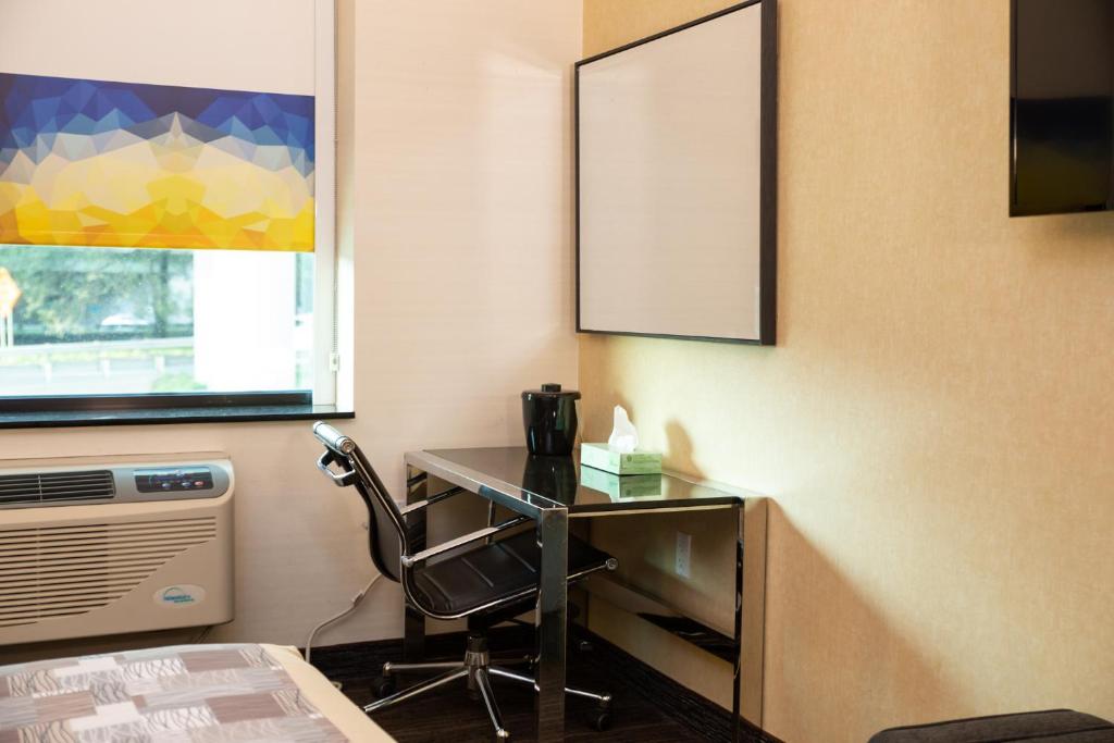 TV a/nebo společenská místnost v ubytování 7 Days Hotel
