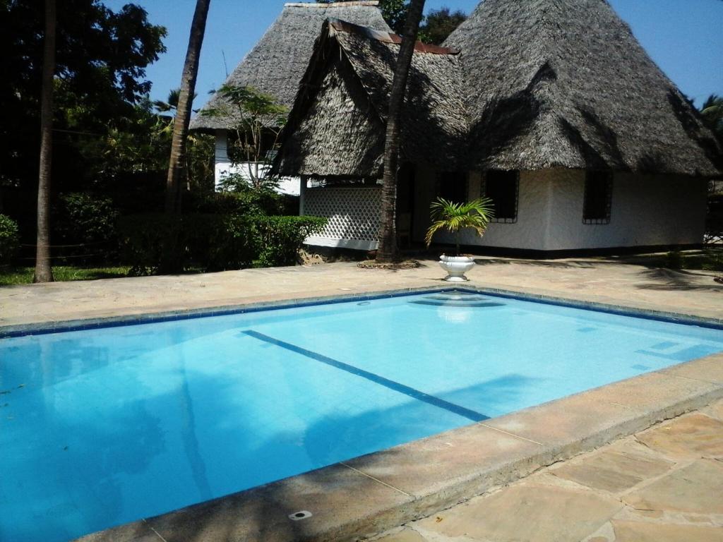Bazén v ubytování Glory Ocean Villas - Diani nebo v jeho okolí