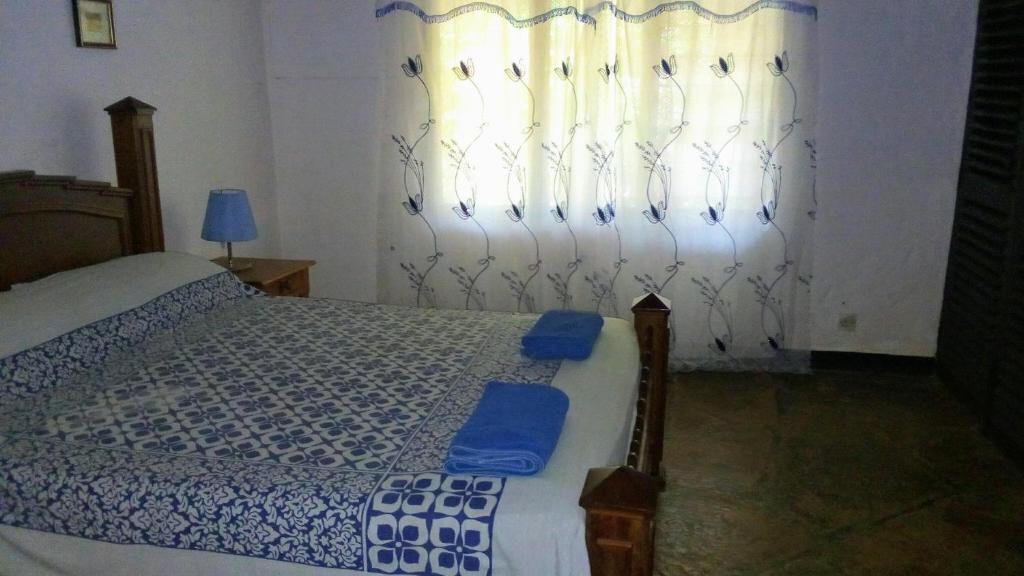 Postel nebo postele na pokoji v ubytování Glory Ocean Villas - Diani