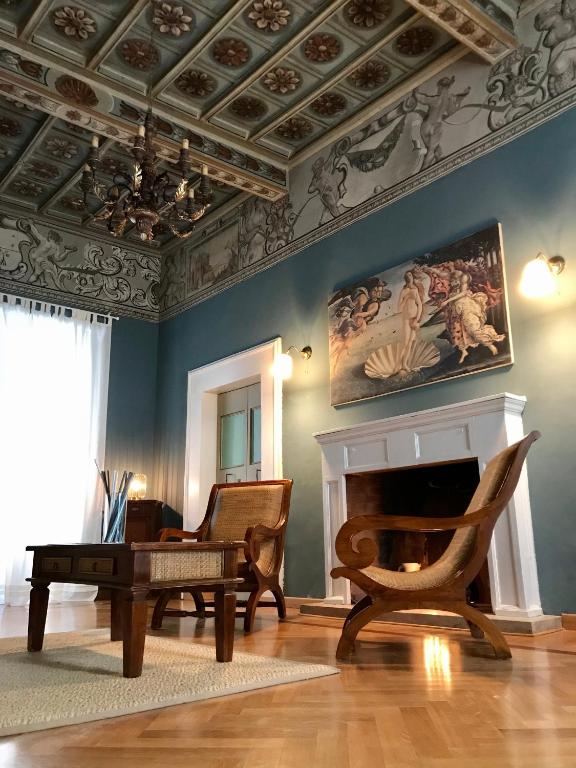 a living room with a couch and a fireplace at La Casa di Helena in Stroncone