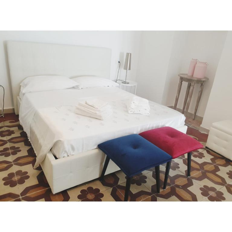 Llit o llits en una habitació de Allegra Toscana - Affittacamere Guest house Arezzo