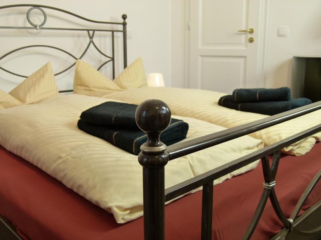 Postel nebo postele na pokoji v ubytování LakeStarnberg Apartments