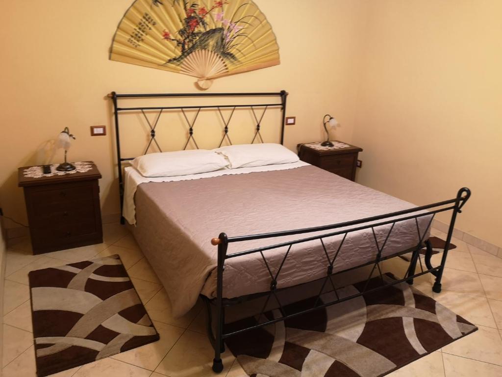 Postel nebo postele na pokoji v ubytování Guest house le grazie