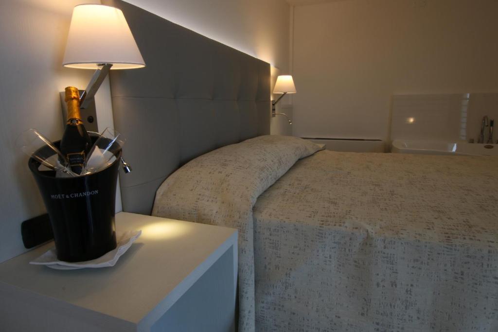 Postel nebo postele na pokoji v ubytování Eraclea Palace Hotel 4 stelle S