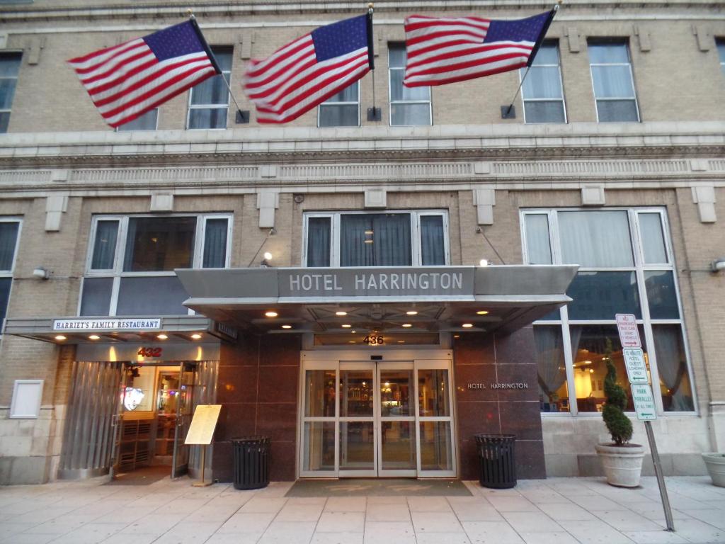 a building with a flag on the front of it at Hotel Harrington in Washington, D.C.