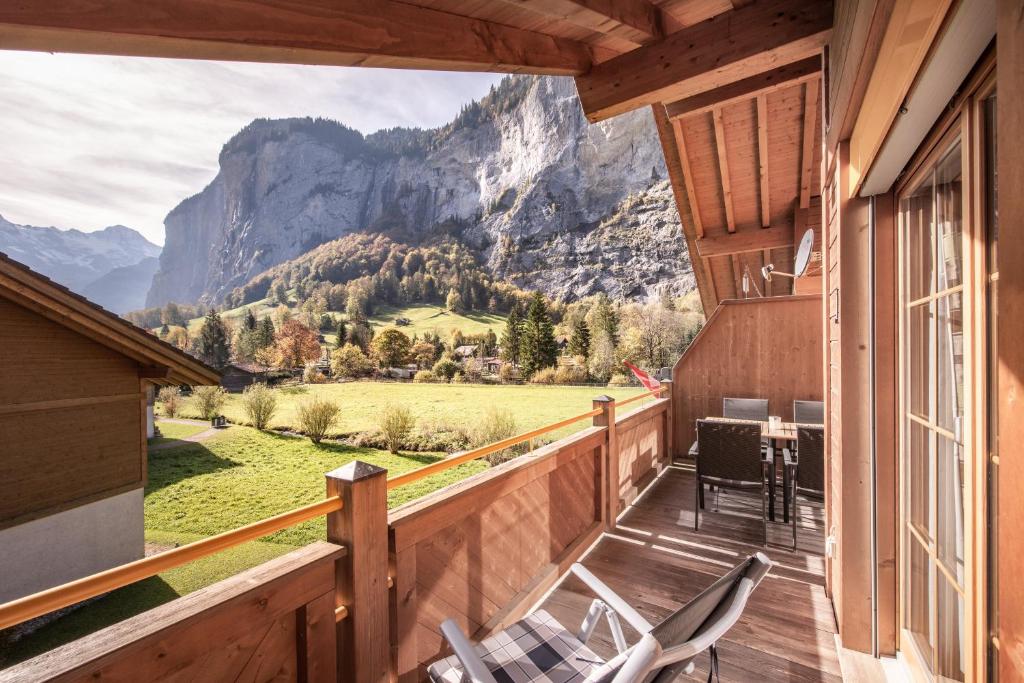 a balcony with a view of the mountains at Apartment Staubbach, Best views, Spacious, Family friendly in Lauterbrunnen