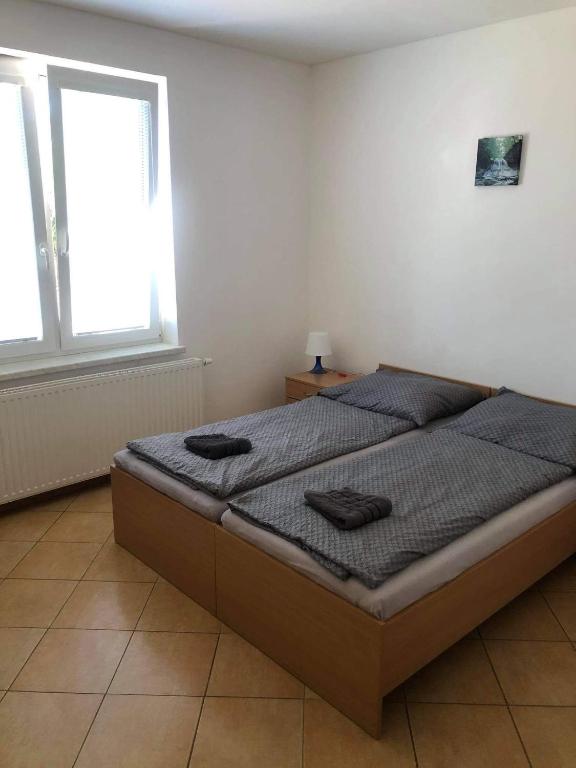 Postel nebo postele na pokoji v ubytování Penzion Adamčík