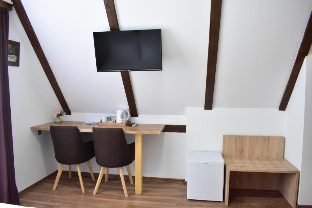 TV a/nebo společenská místnost v ubytování House Boro