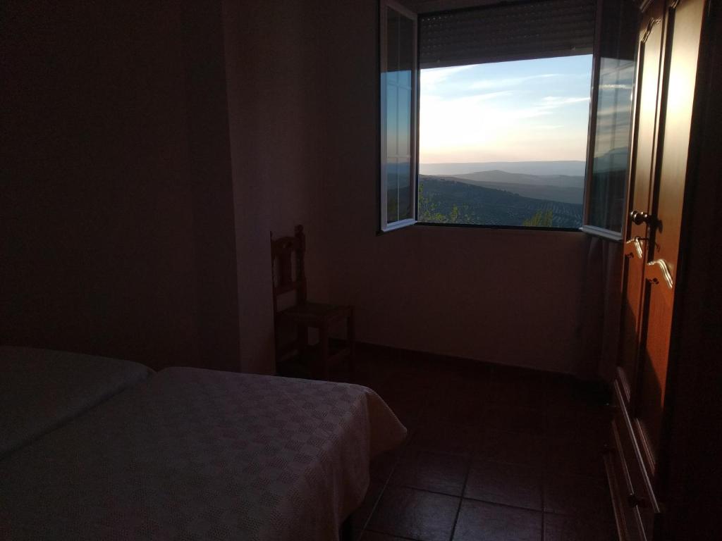 Łóżko lub łóżka w pokoju w obiekcie Apartamento Avenida del Parque