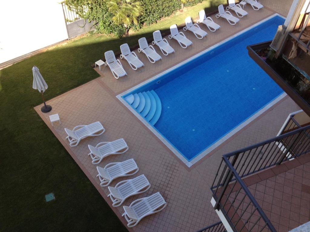 Bazén v ubytování Ferretti Residence Garda Palace nebo v jeho okolí