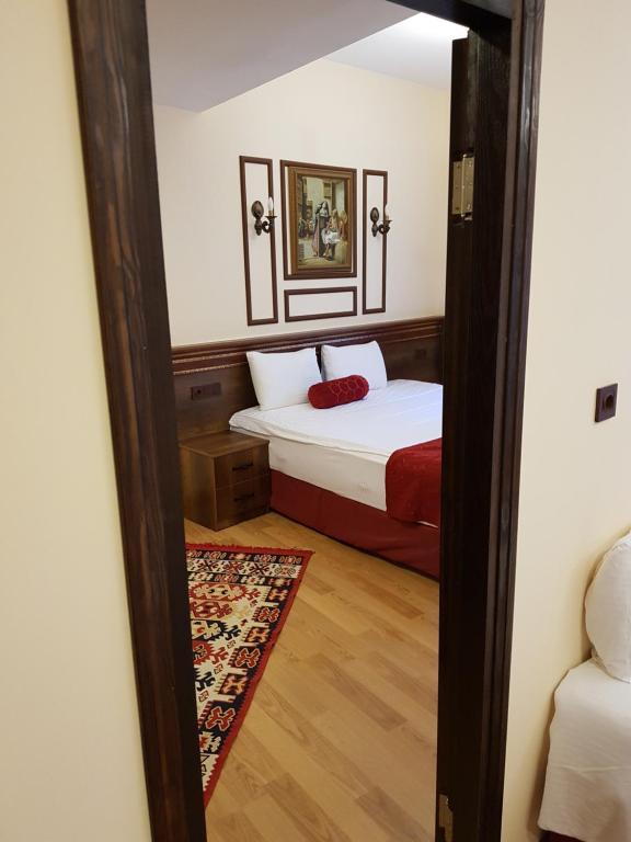 Postel nebo postele na pokoji v ubytování Kervansaray Canakkale Hotel - Special Category