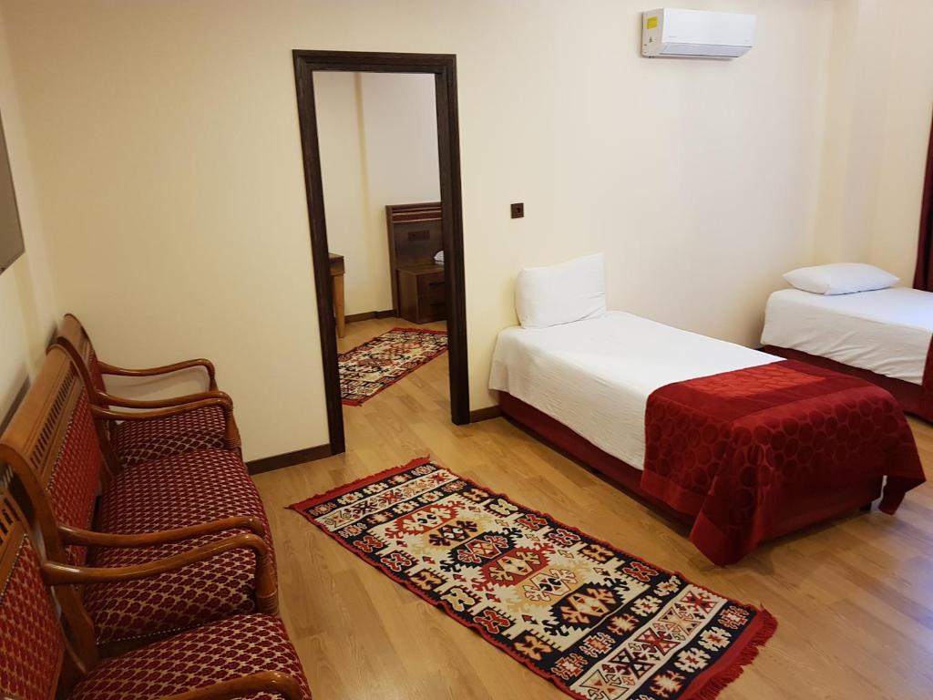 Postel nebo postele na pokoji v ubytování Kervansaray Canakkale Hotel - Special Category