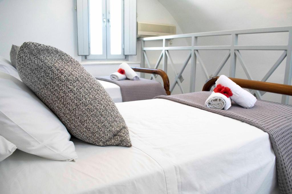Uma cama ou camas num quarto em Pension George