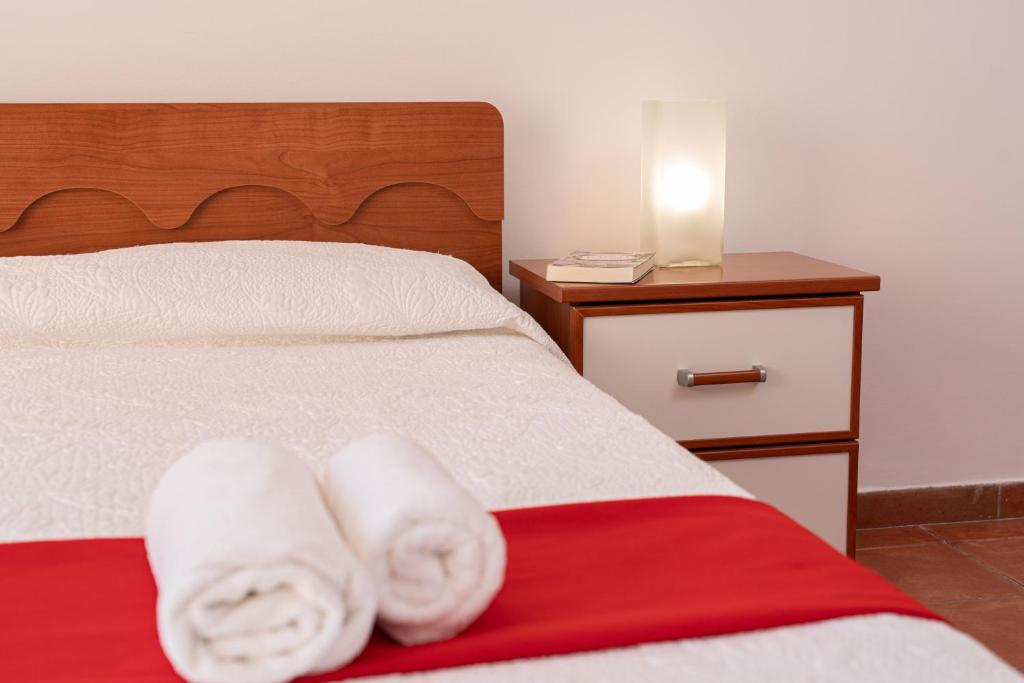 A bed or beds in a room at Felix Residence