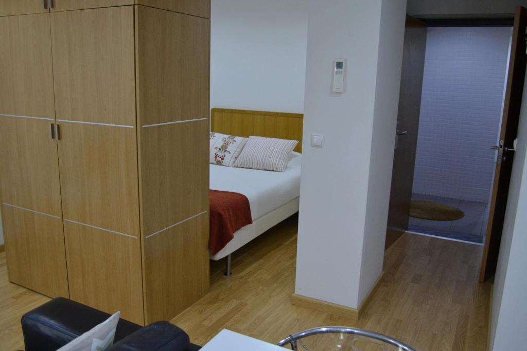 Een bed of bedden in een kamer bij Cerca da Vitoria 2 Sesimbra