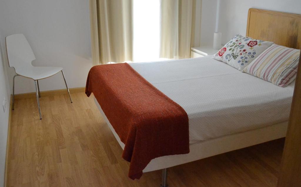 Een bed of bedden in een kamer bij Cerca da Vitoria 2 Sesimbra