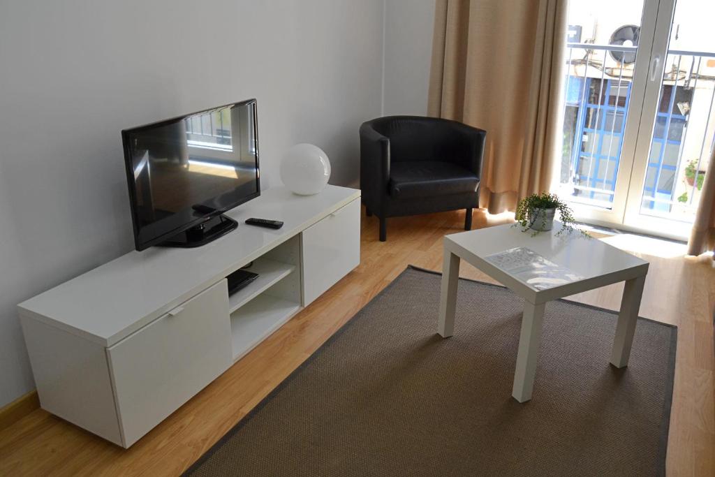 Een TV en/of entertainmentcenter bij Cerca da Vitoria 2 Sesimbra
