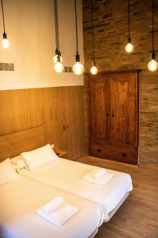 Postel nebo postele na pokoji v ubytování A Casa da Botica