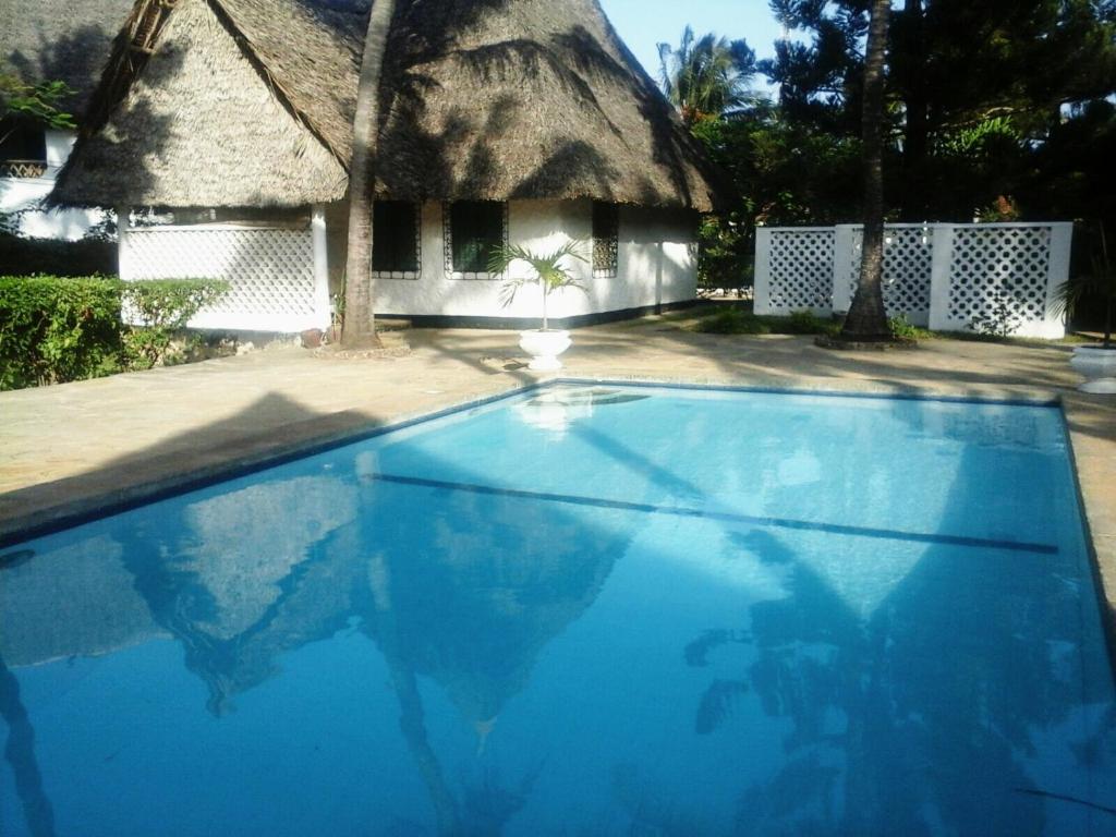 Bazén v ubytování Glory Ocean Villas - Diani nebo v jeho okolí