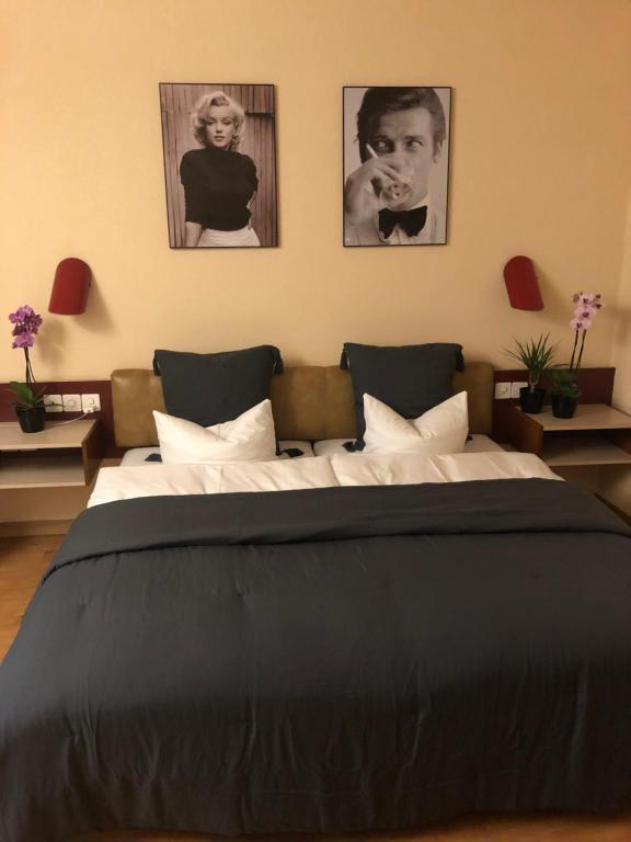 Postel nebo postele na pokoji v ubytování Hotel Casino