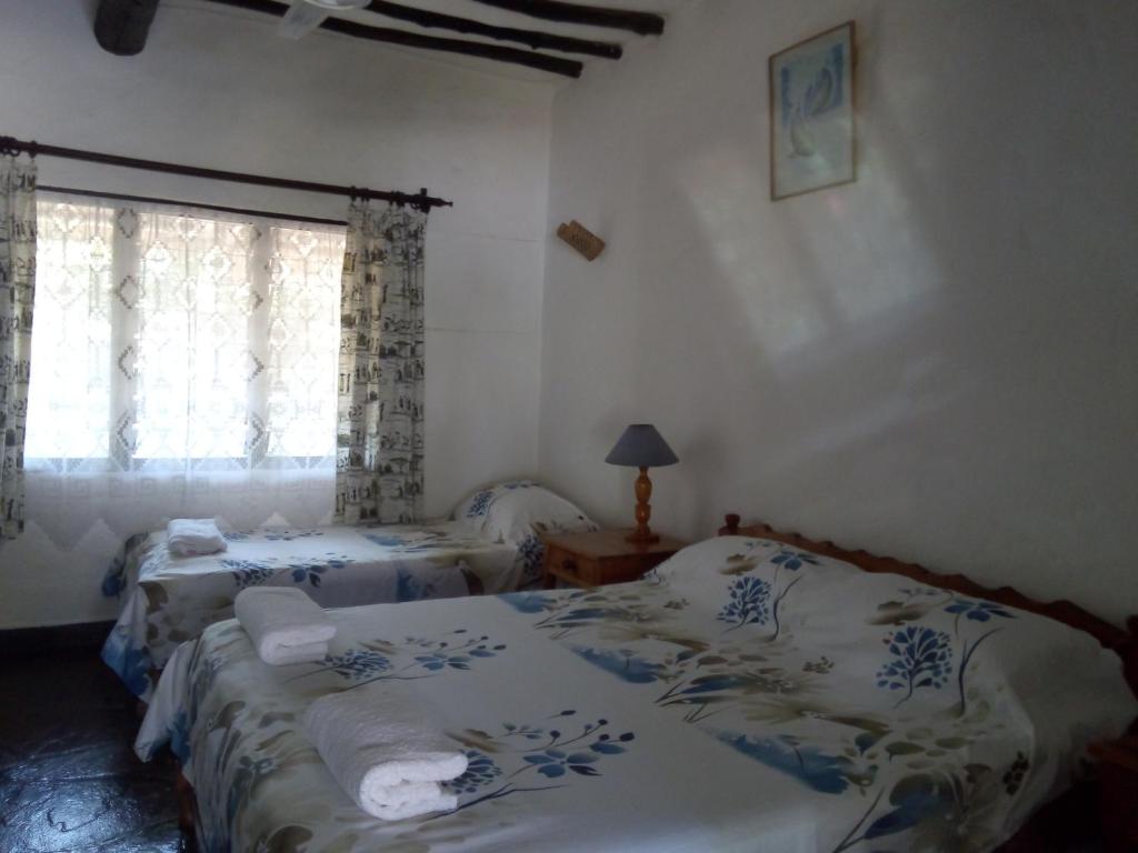 Postel nebo postele na pokoji v ubytování Glory Ocean Villas - Diani