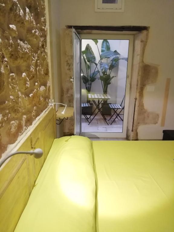 Postel nebo postele na pokoji v ubytování Casa Mapia