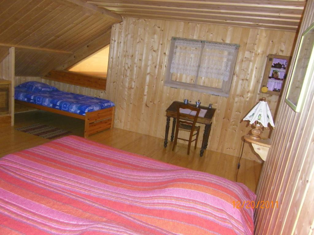 Postel nebo postele na pokoji v ubytování Che'Val d'Amour