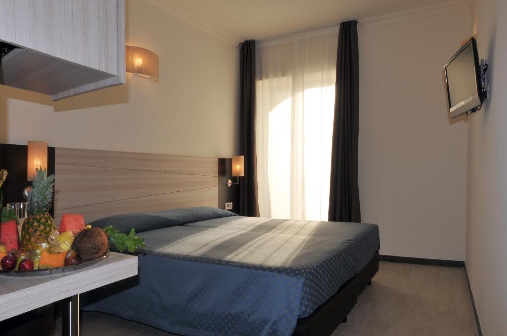 Posteľ alebo postele v izbe v ubytovaní Morcavallo Hotel & Wellness