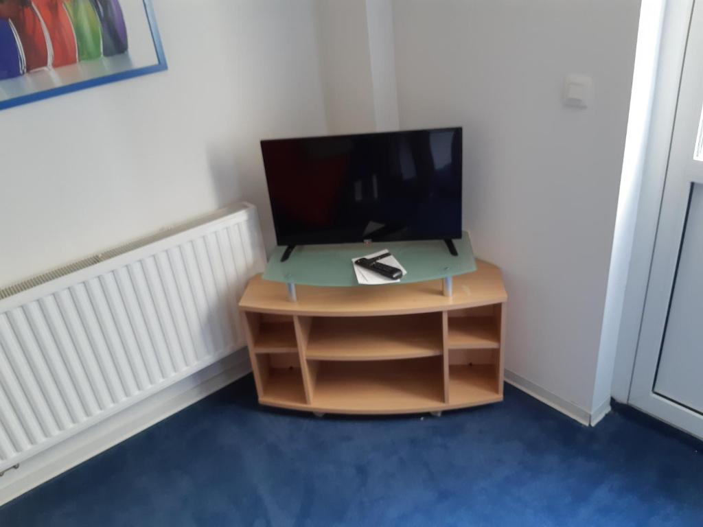TV a/nebo společenská místnost v ubytování Casa ENRICO