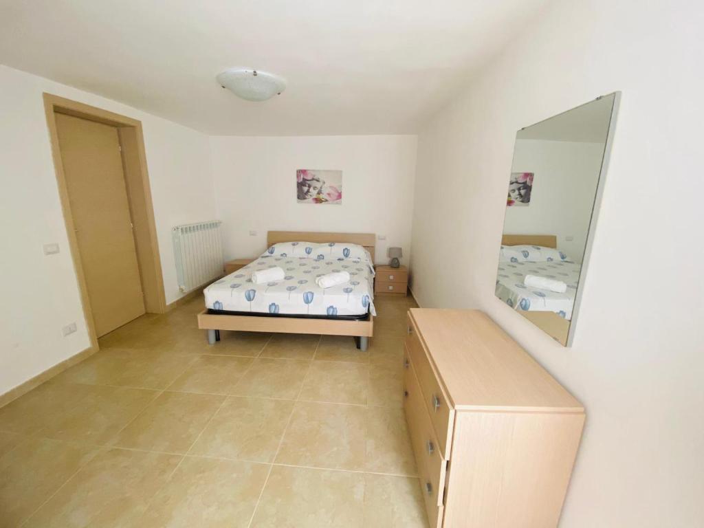 Postel nebo postele na pokoji v ubytování Casa Vacanze Eufemia