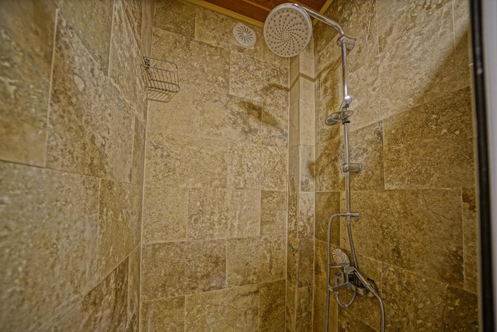 A bathroom at Cappa Cave Hotel