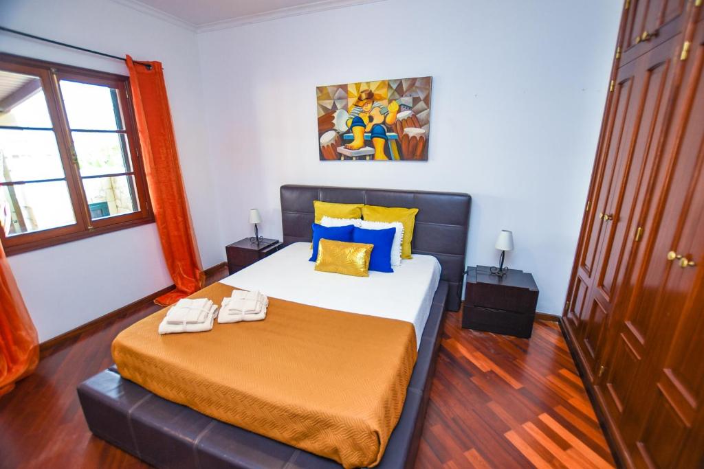 Postel nebo postele na pokoji v ubytování House near CR7 Museum