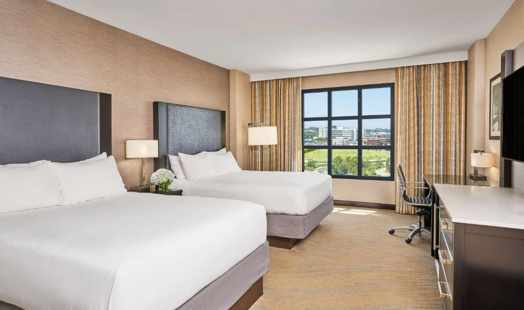 Postel nebo postele na pokoji v ubytování Hyatt Regency La Jolla at Aventine