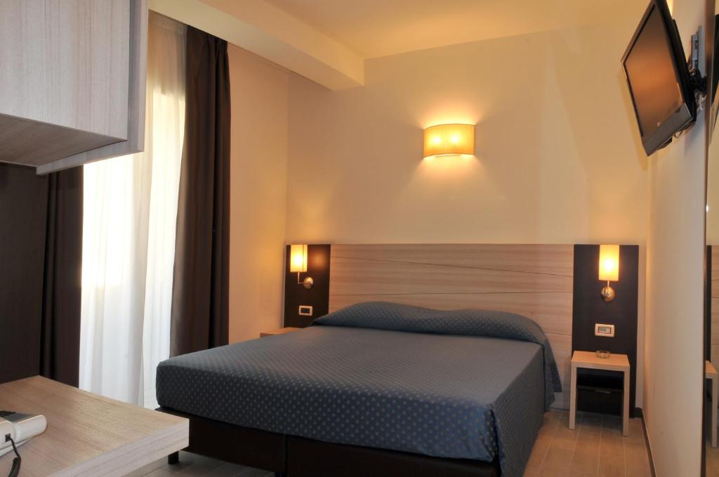 Posteľ alebo postele v izbe v ubytovaní Morcavallo Hotel & Wellness