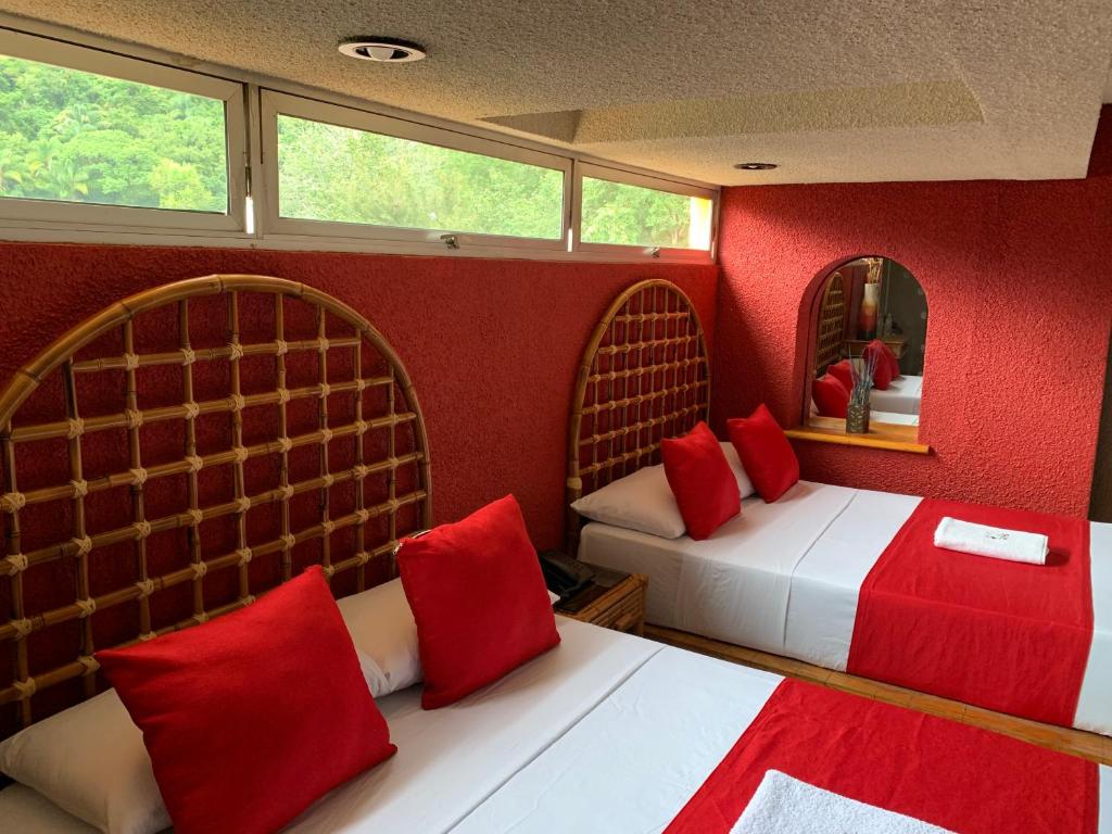 Postel nebo postele na pokoji v ubytování Hotel Alameda
