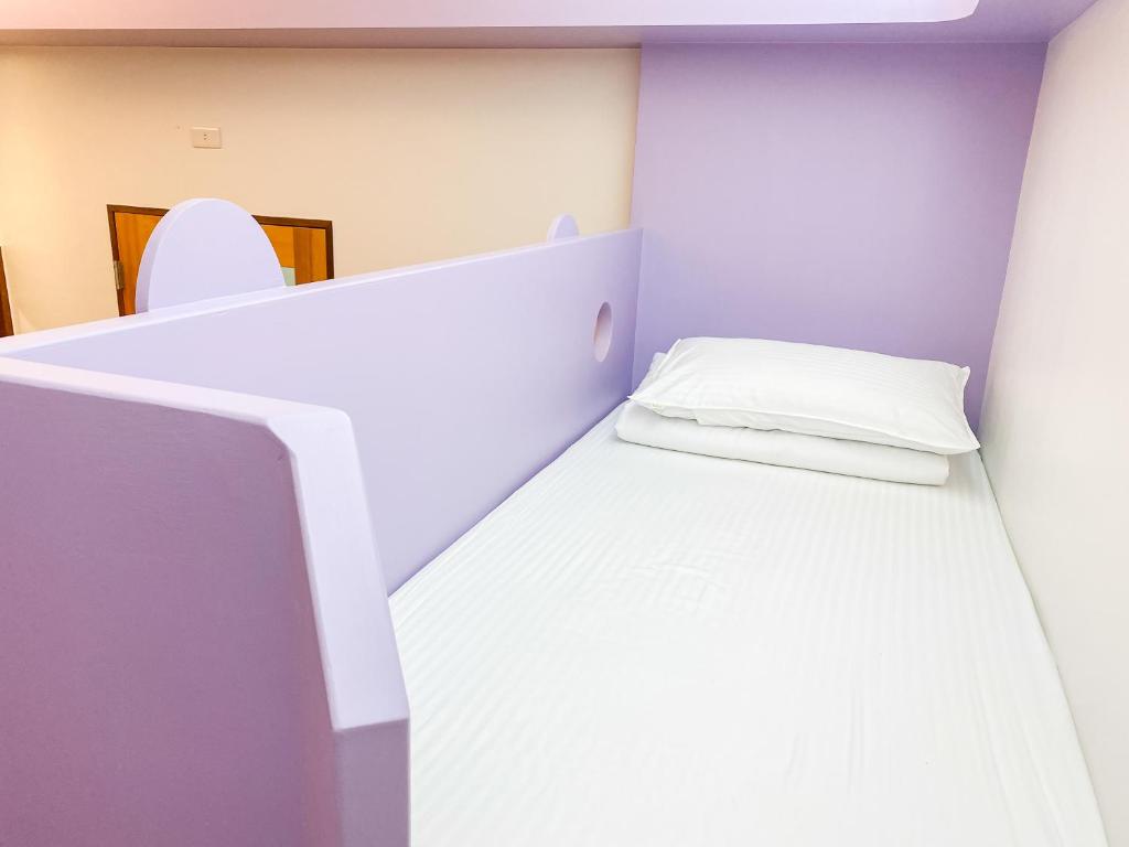 Postel nebo postele na pokoji v ubytování Kids Paradise
