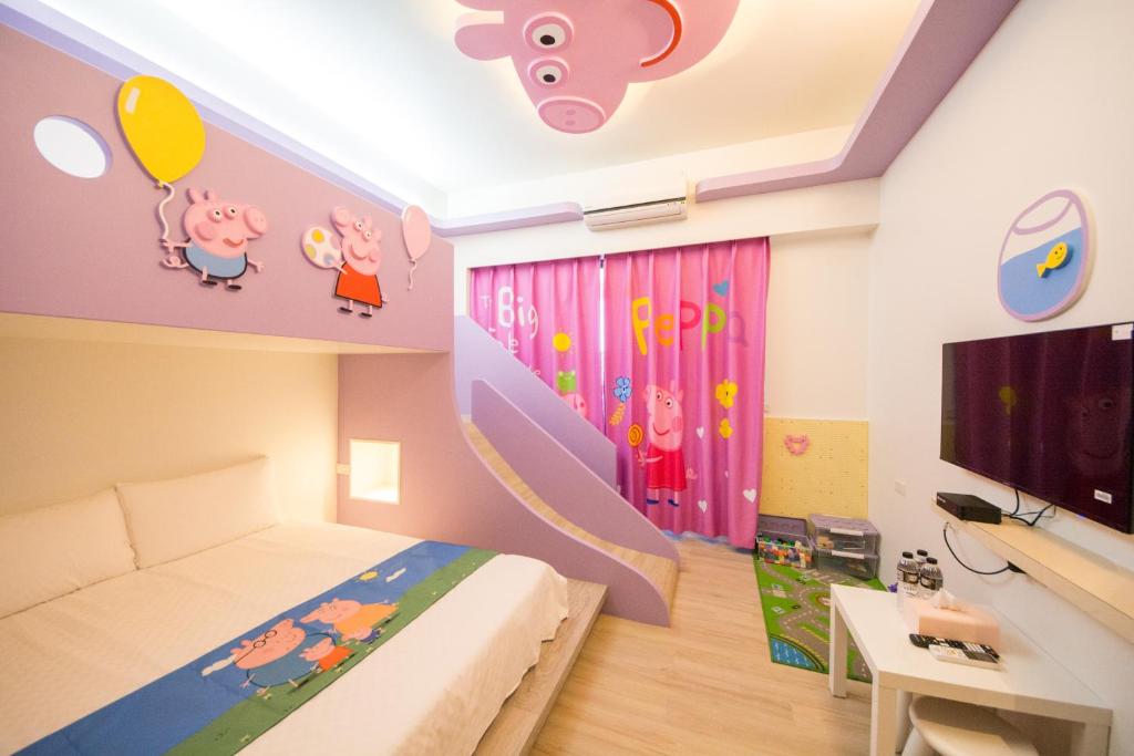 TV a/nebo společenská místnost v ubytování Kids Paradise