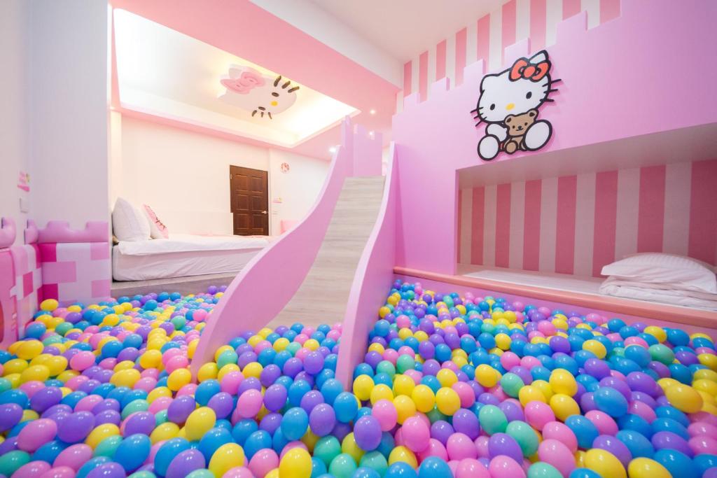 Postel nebo postele na pokoji v ubytování Kids Paradise