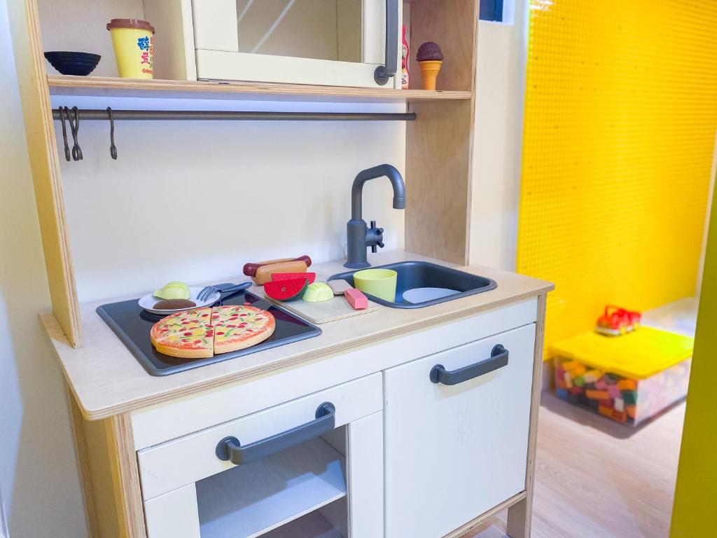 Kuchyň nebo kuchyňský kout v ubytování Kids Paradise