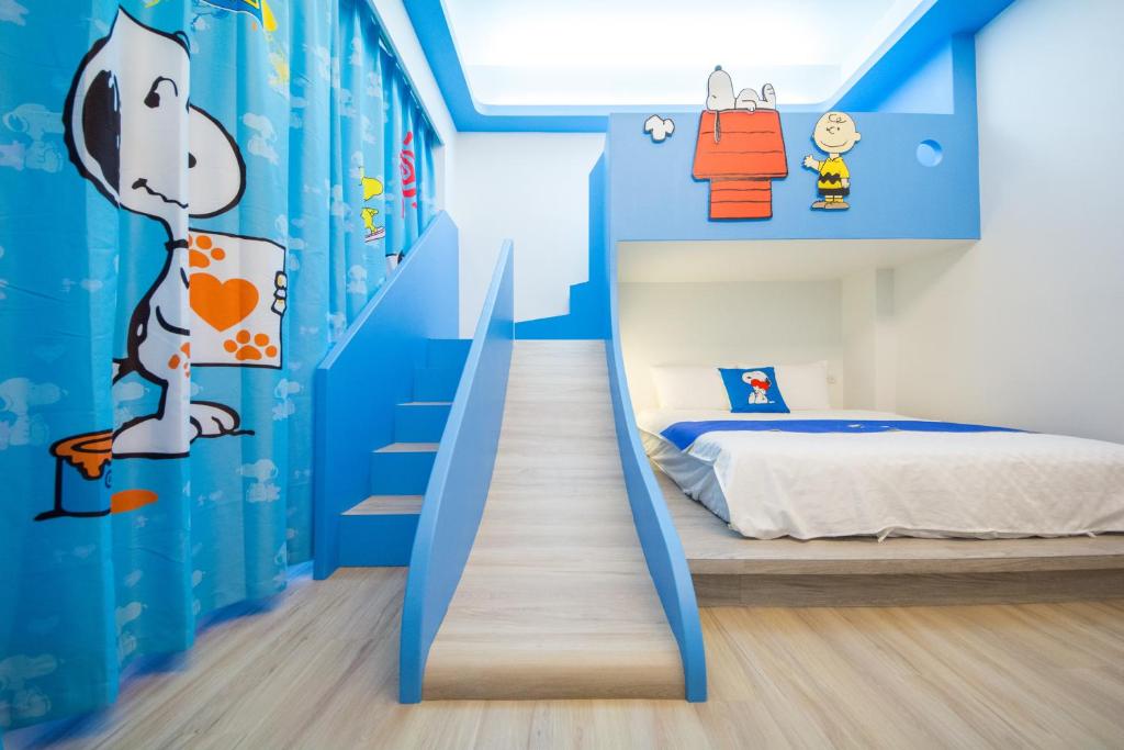 Postel nebo postele na pokoji v ubytování Kids Paradise
