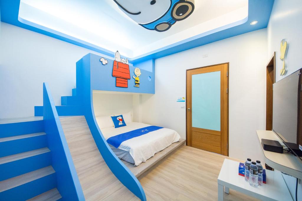 Postel nebo postele na pokoji v ubytování Kids Paradise
