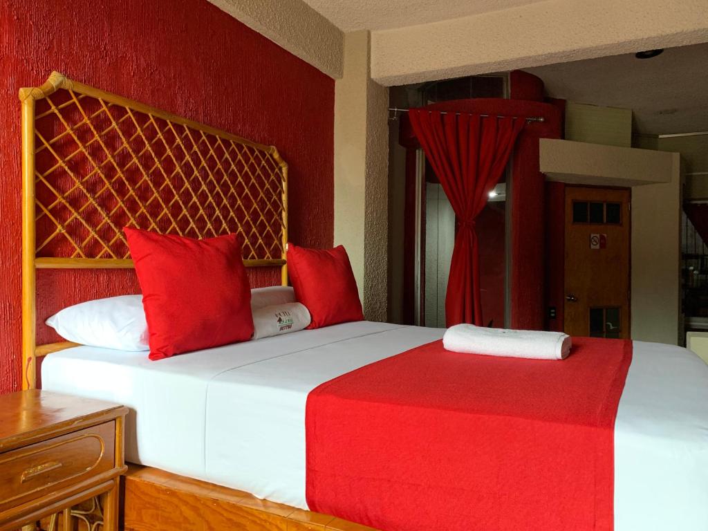 Postel nebo postele na pokoji v ubytování Hotel Alameda
