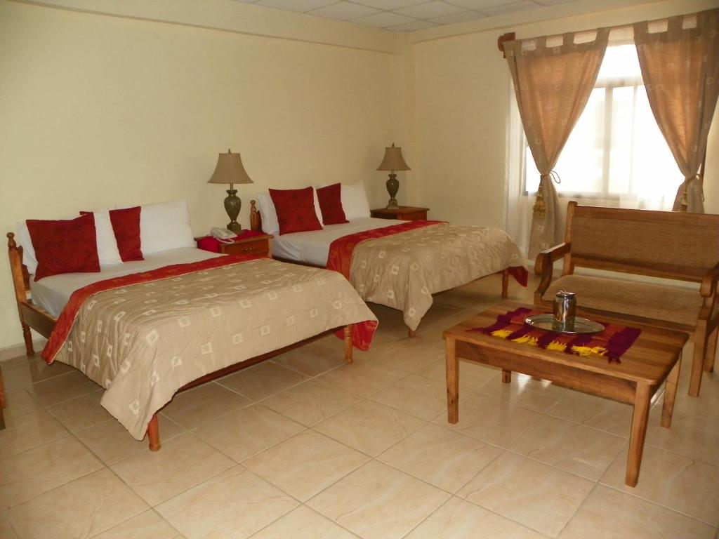 Ένα ή περισσότερα κρεβάτια σε δωμάτιο στο Hotel Ipsan Nah