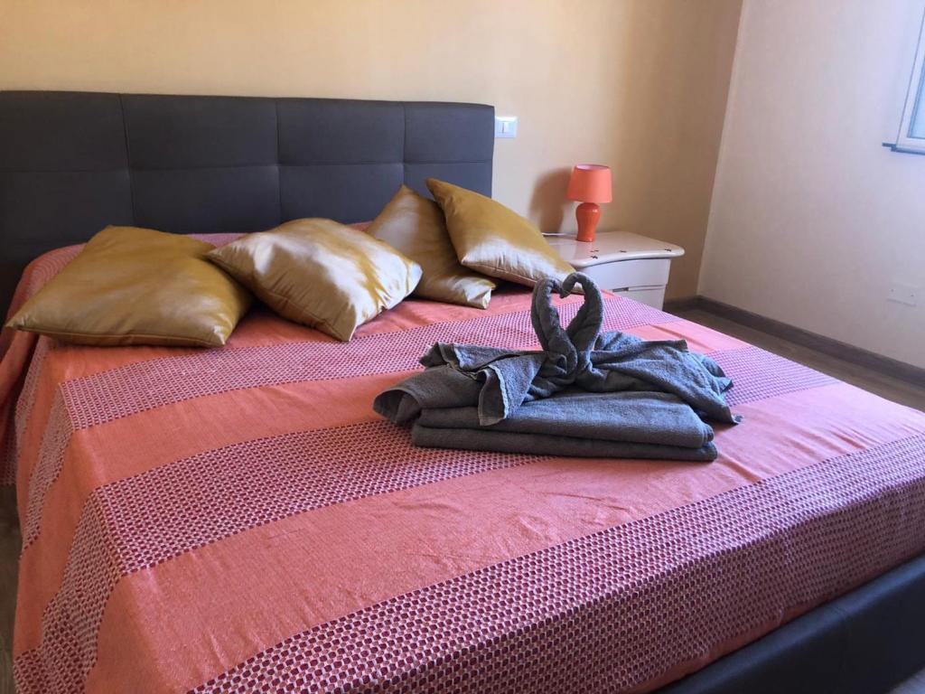 Posteľ alebo postele v izbe v ubytovaní Terrazza sul Mare Vecchio Pontile