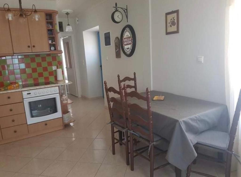Kuchnia lub aneks kuchenny w obiekcie VERANDA BLUE - POROS