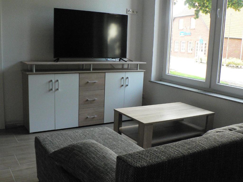 TV a/nebo společenská místnost v ubytování Gästehaus Haalck