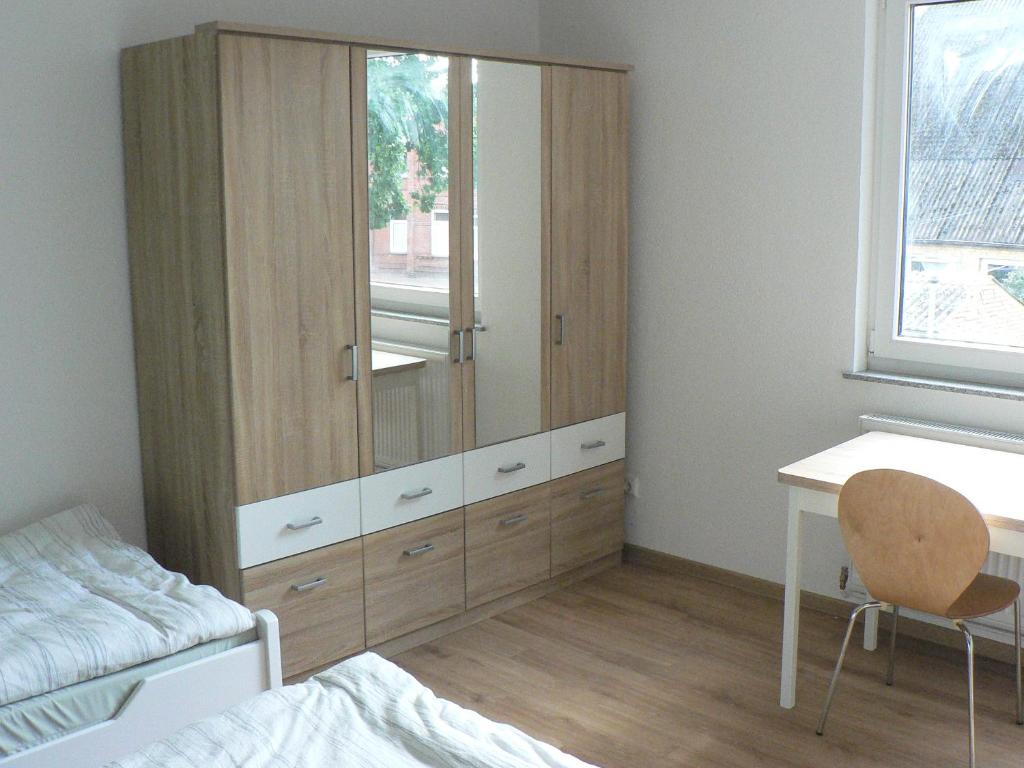 Postel nebo postele na pokoji v ubytování Gästehaus Haalck