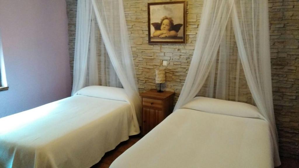 Postel nebo postele na pokoji v ubytování CASA ALTOBIERZO, 9 Habitaciones y 9 BAÑOS