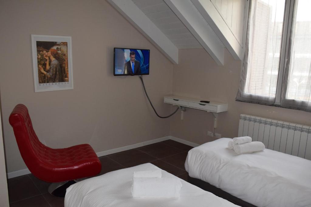 TV a/nebo společenská místnost v ubytování B&B Leonardo